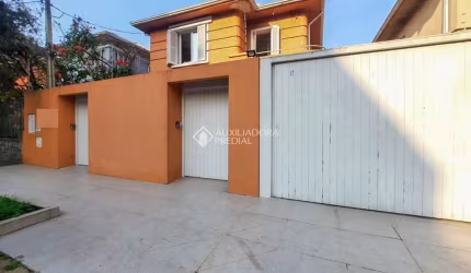 Casa em condomínio fechado com 5 quartos à venda na Rua Professor Juvenal Miler, 91, Rio Branco, Porto Alegre, 360 m2 por R$ 1.700.000