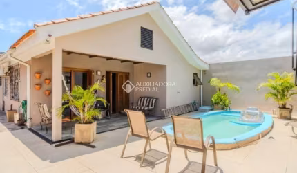 Casa em condomínio fechado com 3 quartos à venda na Rua Doutor Mário Totta, 3051, Tristeza, Porto Alegre, 130 m2 por R$ 629.000