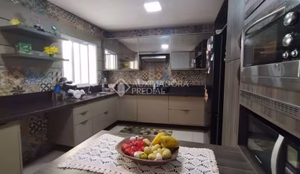 Casa em condomínio fechado com 4 quartos à venda na Rua Lindolfo Collor, 448, Morada do Vale III, Gravataí, 200 m2 por R$ 634.940