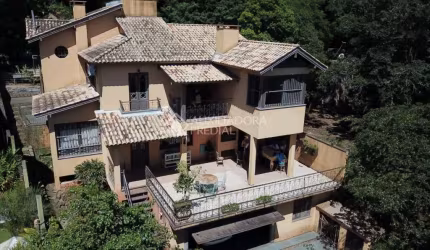 Casa em condomínio fechado com 3 quartos à venda na Avenida Guaíba, 12692, Ipanema, Porto Alegre, 323 m2 por R$ 1.990.000