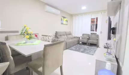 Casa em condomínio fechado com 3 quartos à venda na Avenida Obedy Cândido Vieira, 801, Central Parque, Cachoeirinha, 102 m2 por R$ 670.000