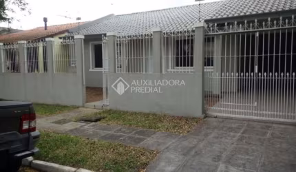 Casa em condomínio fechado com 3 quartos à venda na Rua das Araucárias, 1090, Harmonia, Canoas, 115 m2 por R$ 700.000