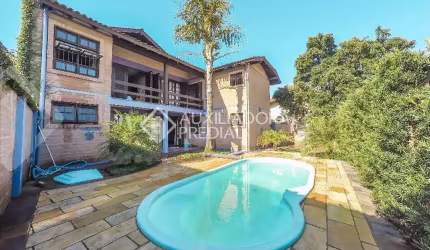 Casa em condomínio fechado com 5 quartos à venda na Rua América, 581, Morro do Espelho, São Leopoldo, 427 m2 por R$ 1.300.000