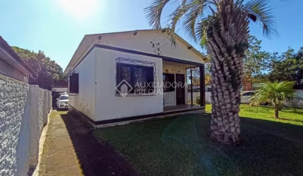 Casa com 3 quartos à venda na Rua Barcelona, 596, Lomba do Pinheiro, Porto Alegre, 65 m2 por R$ 400.000