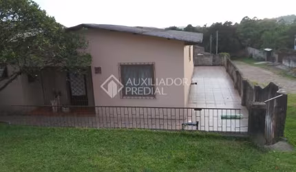 Casa em condomínio fechado com 2 quartos à venda na Rua Doze de Outubro, 546, Santo Onofre, Viamão, 200 m2 por R$ 340.000