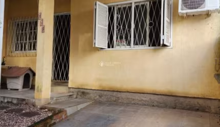 Casa com 3 quartos à venda na DOS FALCOES, 210, Jardim Algarve, Alvorada, 90 m2 por R$ 295.000