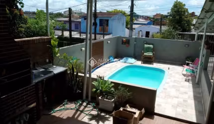 Casa com 3 quartos à venda na Gralhas, 131, Jardim Algarve, Alvorada, 113 m2 por R$ 310.000