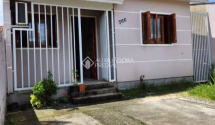 Casa com 3 quartos à venda na Rua Corujas, 566, Jardim Algarve, Alvorada, 70 m2 por R$ 370.000