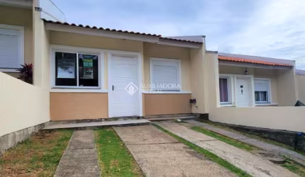 Casa em condomínio fechado com 2 quartos à venda na Rua Oscar Schick, 2350, Formoza, Alvorada, 66 m2 por R$ 245.000