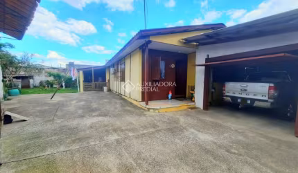 Casa com 3 quartos à venda na Pompílio dos Reis, 6, Jardim Algarve, Alvorada, 90 m2 por R$ 280.000