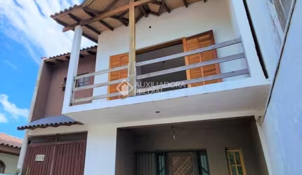 Casa com 3 quartos à venda na Avenida Zero Hora, 580, Jardim Algarve, Alvorada, 160 m2 por R$ 475.000