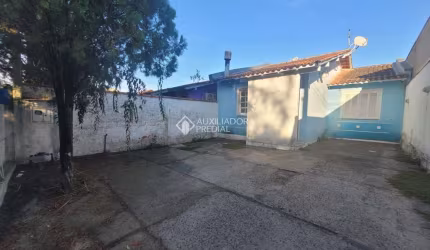 Casa com 4 quartos à venda na Rua Caturritas, 566, Jardim Algarve, Alvorada, 120 m2 por R$ 280.000