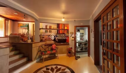 Casa com 4 quartos à venda na Rua Doutor Paulino Guerra, 575, Jardim Itu Sabará, Porto Alegre, 345 m2 por R$ 1.300.000