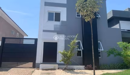 Casa em condomínio fechado com 3 quartos à venda na Avenida Senador Salgado Filho, 8500, Jardim Krahe, Viamão, 220 m2 por R$ 1.500.000