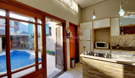 Casa em condomínio fechado com 3 quartos à venda na Rua Barão do Amazonas, 2057, Partenon, Porto Alegre, 110 m2 por R$ 630.000