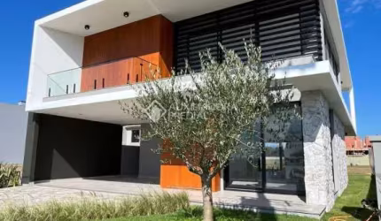 Casa em condomínio fechado com 4 quartos à venda na Ipanema, 0800, Curumim, Capão da Canoa, 300 m2 por R$ 2.700.000