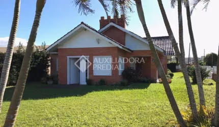 Casa em condomínio fechado com 4 quartos à venda na Rua Miraguaia, 159, Centro, Xangri-Lá, 284 m2 por R$ 980.000