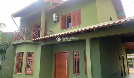 Casa com 2 quartos à venda na Avenida Florida, 929, Flórida, Guaíba, 276 m2 por R$ 800.000