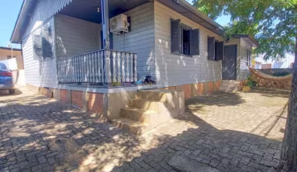 Casa com 4 quartos à venda na JOSE VALDIR GARCIA, 34, Columbia City, Guaíba, 130 m2 por R$ 400.000