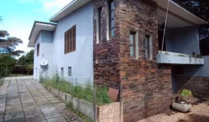 Casa com 5 quartos à venda na Avenida Farroupilha, 316, Flórida, Guaíba, 200 m2 por R$ 450.000
