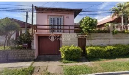 Casa em condomínio fechado com 6 quartos à venda na Avenida Dona Frutuosa, 324, Coronel Nassuca, Guaíba, 311 m2 por R$ 980.000