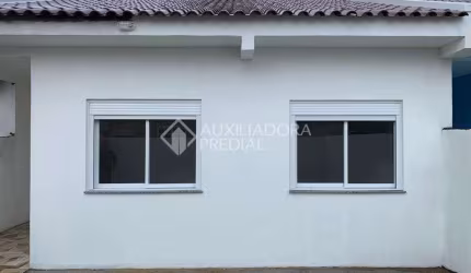 Casa em condomínio fechado com 3 quartos à venda na Rua Panambi, 24, Centro, Eldorado do Sul, 78 m2 por R$ 370.000