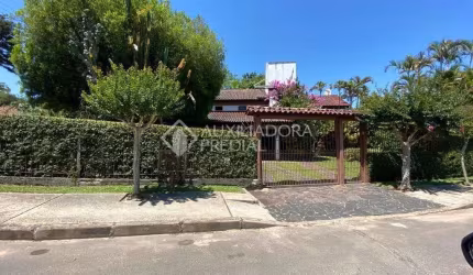 Casa em condomínio fechado com 4 quartos à venda na Avenida Florida, 290, Flórida, Guaíba, 500 m2 por R$ 1.500.000