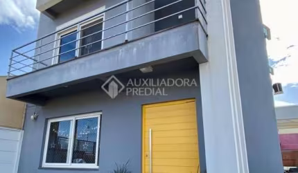Casa com 3 quartos à venda na Rua Celina Rosa da Silva, 111, Jardim dos Lagos, Guaíba, 166 m2 por R$ 750.000