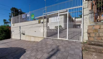 Casa com 3 quartos à venda na Avenida Dona Frutuosa, 746, Coronel Nassuca, Guaíba, 165 m2 por R$ 800.000