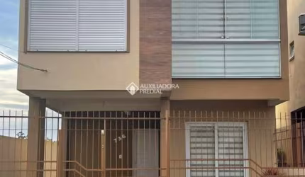 Casa com 3 quartos à venda na Rua O Tempo e o Vento, 736, Jardim dos Lagos, Guaíba, 87 m2 por R$ 420.000