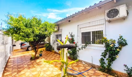 Casa em condomínio fechado com 3 quartos à venda na Rua das Orquídeas, 48, Harmonia, Canoas, 98 m2 por R$ 575.000
