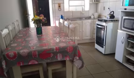 Casa com 3 quartos à venda na Bastian, 104, Piratini, Alvorada, 60 m2 por R$ 212.000