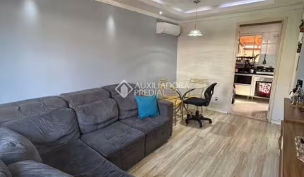 Casa em condomínio fechado com 2 quartos à venda na Rua dos Guaramirins, 303, Igara, Canoas, 90 m2 por R$ 325.000