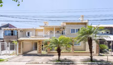 Casa com 5 quartos à venda na Rua Escócia, 51, Marechal Rondon, Canoas, 261 m2 por R$ 2.149.000