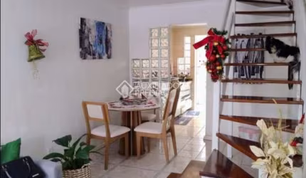 Casa em condomínio fechado com 2 quartos à venda na Avenida Guilherme Schell, 1250, Rio Branco, Canoas, 76 m2 por R$ 276.000