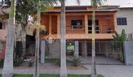 Casa em condomínio fechado com 3 quartos à venda na Rua Doutor Breno Roberto Cassel, 121, Nossa Senhora das Graças, Canoas, 245 m2 por R$ 796.000