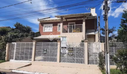 Casa em condomínio fechado com 3 quartos à venda na Rua das Timbaúvas, 76, Igara, Canoas, 280 m2 por R$ 1.599.000