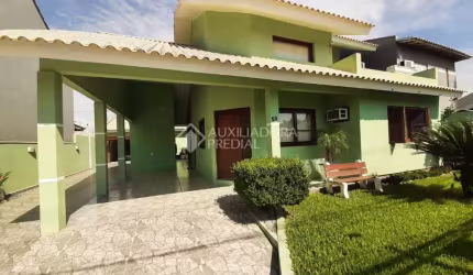 Casa em condomínio fechado com 3 quartos à venda na Rua dos Pardais, 50, Igara, Canoas, 230 m2 por R$ 900.000