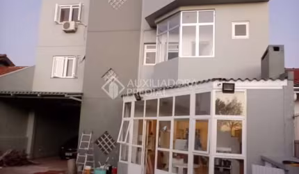 Casa em condomínio fechado com 4 quartos à venda na Rua Doutor João César Krieger, 127, Rubem Berta, Porto Alegre, 468 m2 por R$ 1.100.000
