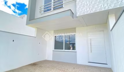Casa em condomínio fechado com 3 quartos à venda na Rua Ravena, 70, Estância Velha, Canoas, 125 m2 por R$ 690.000