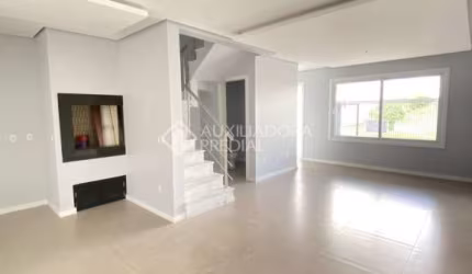 Casa em condomínio fechado com 3 quartos à venda na Rua Ravena, 66, Estância Velha, Canoas, 125 m2 por R$ 690.000