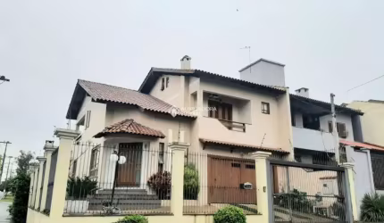 Casa com 3 quartos à venda na Rua Turquia, 18, Marechal Rondon, Canoas, 255 m2 por R$ 1.170.000