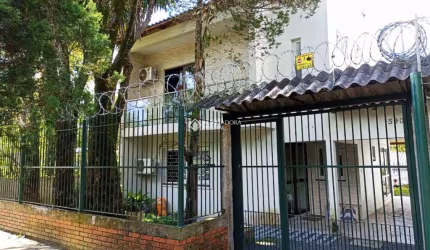 Casa com 3 quartos à venda na Rua Lauro Rodrigues, 590, Costa e Silva, Porto Alegre, 197 m2 por R$ 520.000