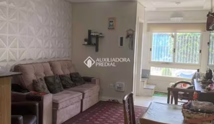 Casa em condomínio fechado com 3 quartos à venda na Rua Dante Poggetti, 326, Jardim Itu Sabará, Porto Alegre, 113 m2 por R$ 525.000
