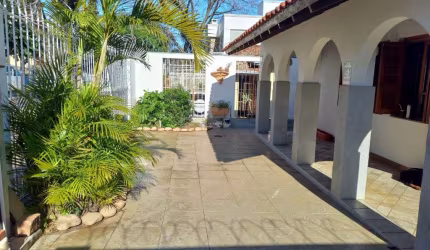 Casa com 3 quartos à venda na Rua Cangussu, 587, Nonoai, Porto Alegre, 284 m2 por R$ 1.000.000