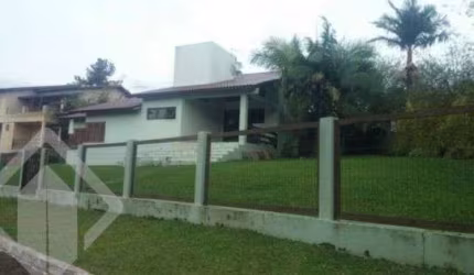 Casa em condomínio fechado com 4 quartos à venda na Estrada Capitão Gentil Machado de Godoy, 4500, Vila Elsa, Viamão, 220 m2 por R$ 930.000