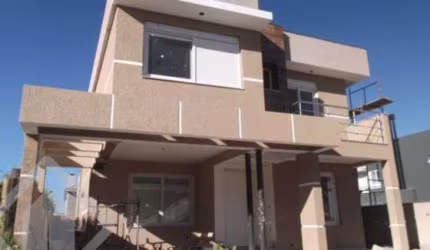 Casa em condomínio fechado com 2 quartos à venda na Avenida Senador Salgado Filho, 83, Jardim Krahe, Viamão, 212 m2 por R$ 950.000