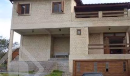 Casa em condomínio fechado com 3 quartos à venda na Estrada Capitão Gentil Machado de Godoy, 4500, Vila Elsa, Viamão, 400 m2 por R$ 1.300.000