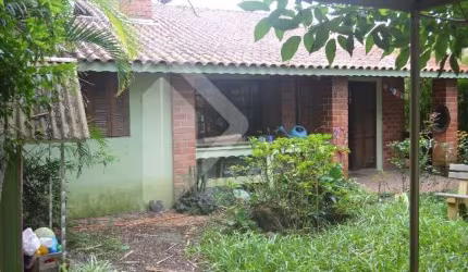 Casa em condomínio fechado com 4 quartos à venda na Rua Caroba, 105, Cantegril, Viamão, 109 m2 por R$ 400.000