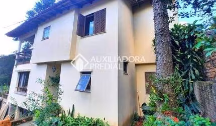 Casa em condomínio fechado com 3 quartos à venda na Avenida Senador Salgado Filho, 85800, Jardim Krahe, Viamão, 184 m2 por R$ 460.000